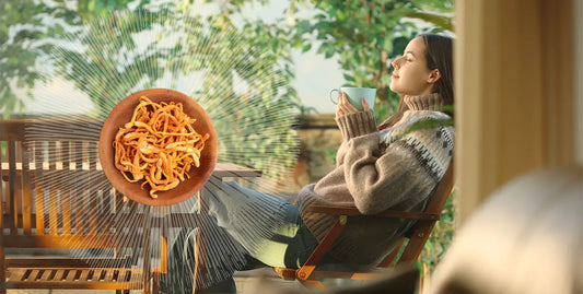 A woman relaxing outside microdosing functional mushrooms